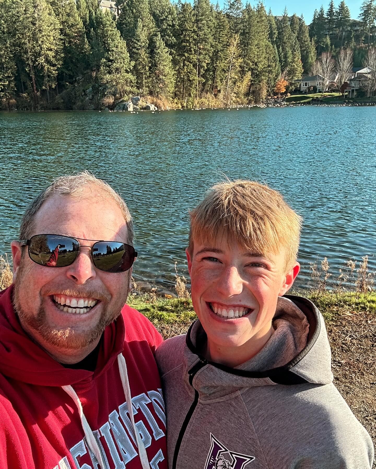 TJ and his son at the lake
